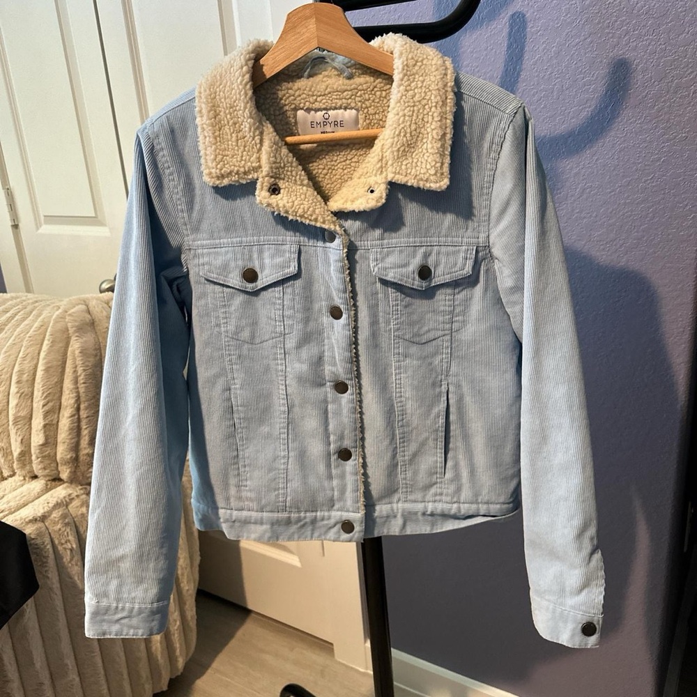 Blue Denim Jacket with cream Sherpa Lining and button up closure